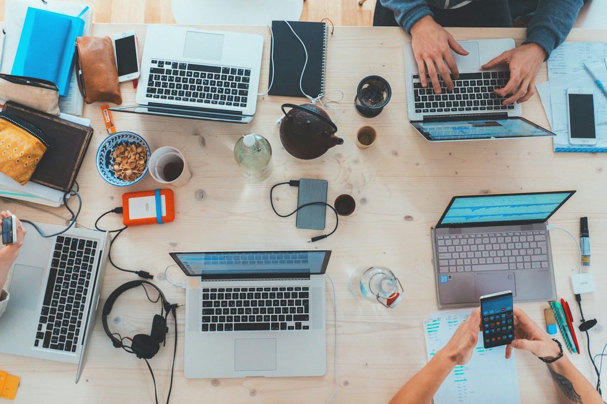 Collaborators using connected devices to plan platform-specific social content