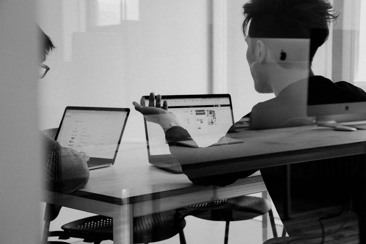 Agency colleagues planning tasks and reviewing a project together