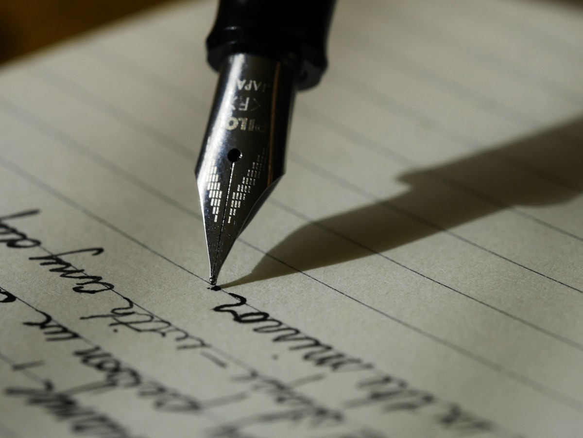 Writer shaping an editorial narrative with handwritten notes
